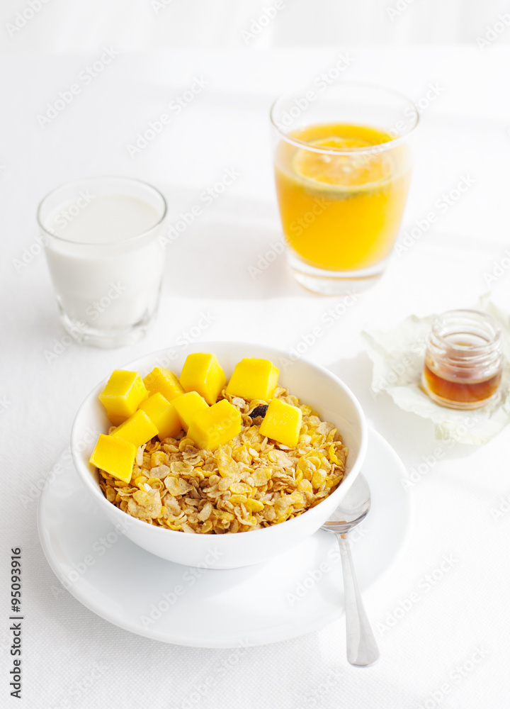 Healthy breakfast. Corn flakes, muesli, granola, with fresh orange juice Healthy breakfast. Corn flakes, muesli, granola, with fresh orange juice