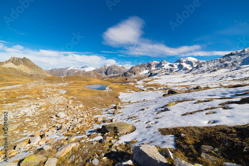 High altitude blue alpine lake in autumn season © fabio lamanna
