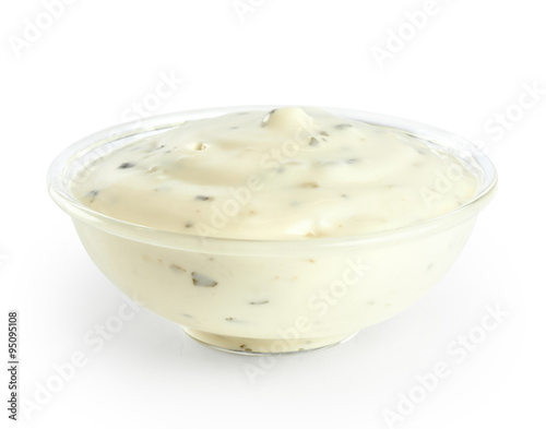 Bowl of tartar sauce isolated on white background.