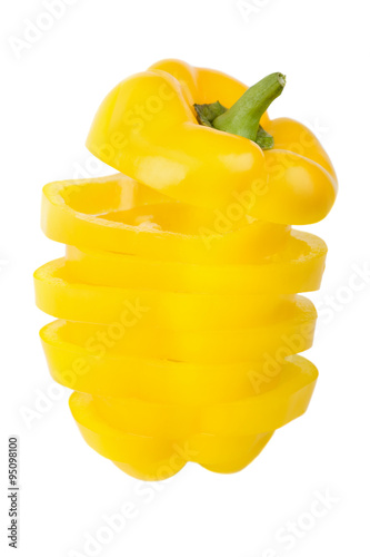 Yellow paprika from slices isolated on white