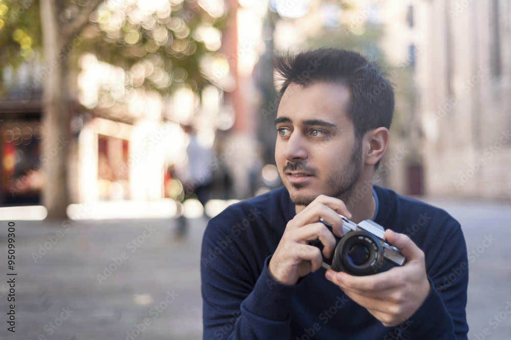 Young man taking photos in Barcelona Young man taking photos in Barcelona