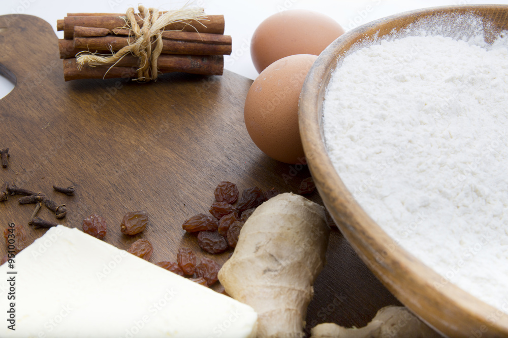 products for baking on a wooden boards background products for baking on a wooden boards background