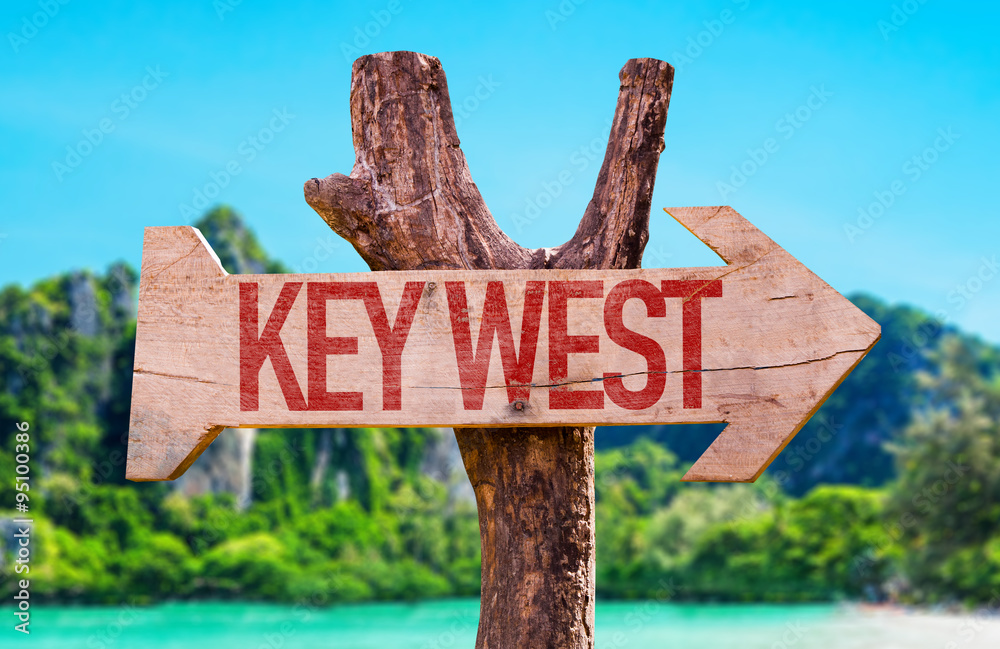 Key West arrow with beach background
