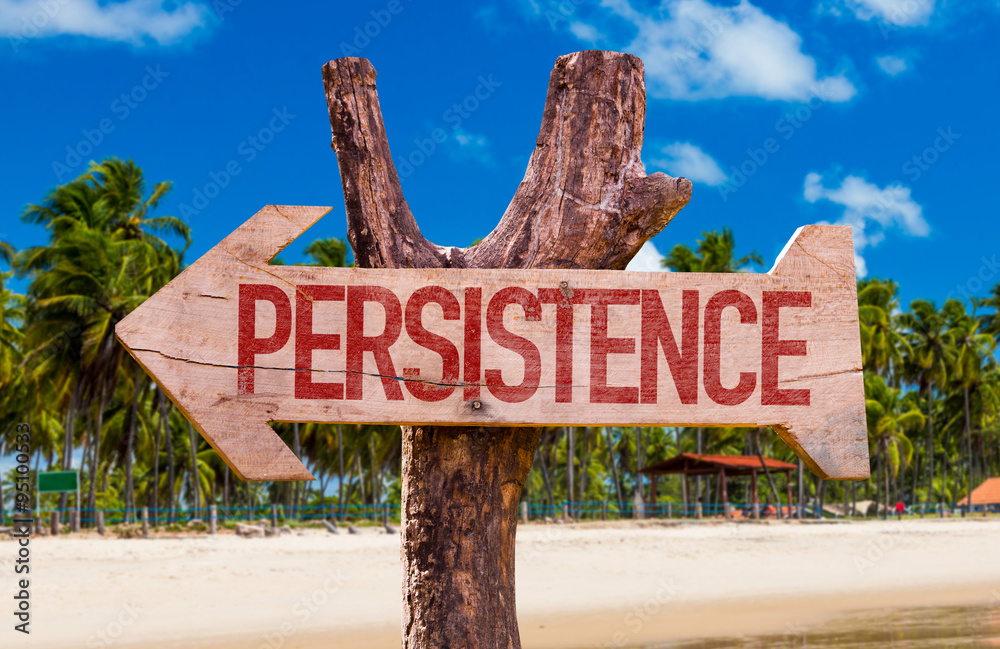 Persistence arrow with beach background