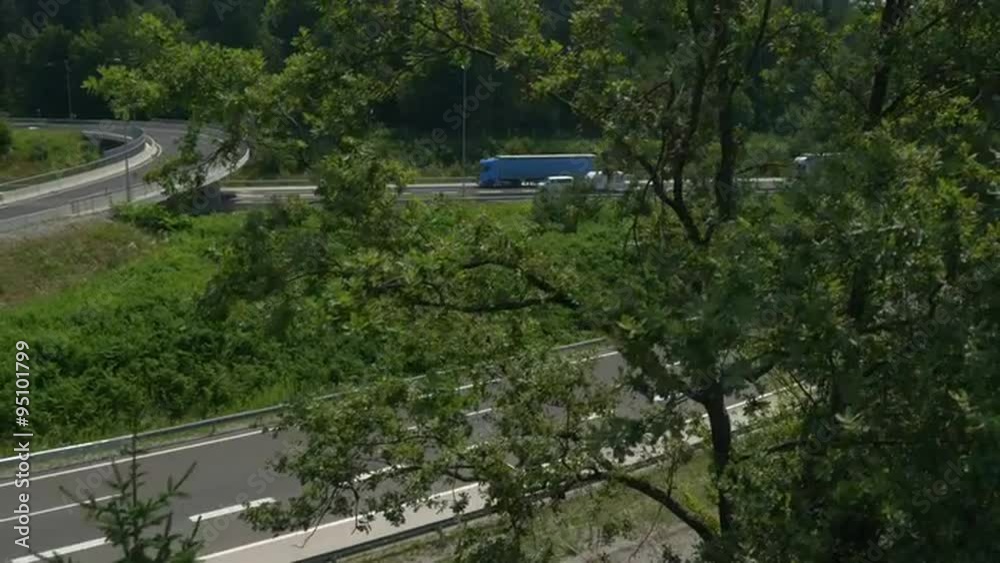 AERIAL: Busy highway towards the big city AERIAL: Busy highway towards the big city