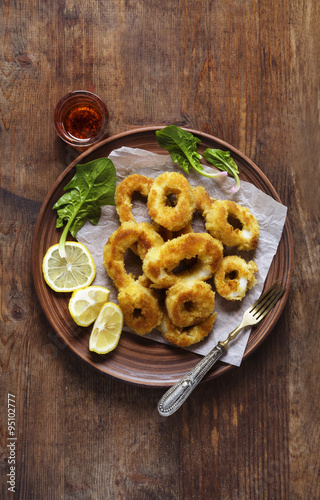 Squid rings, Fried in egg and Lemon. Healthy Mediterranean Appet