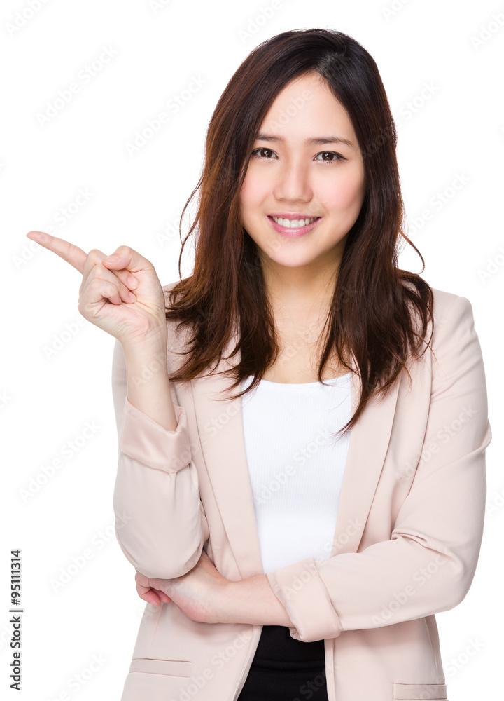 Businesswoman with finger point aside Businesswoman with finger point aside