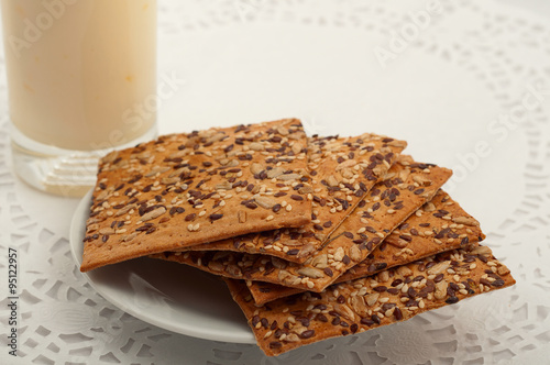 healthy fitness cookies with different seeds on a white tableclo