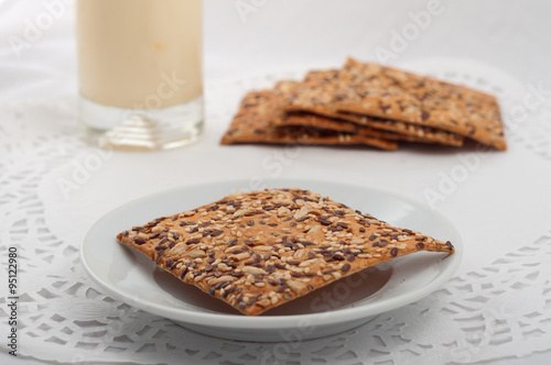 healthy fitness cookies with different seeds on a white tableclo