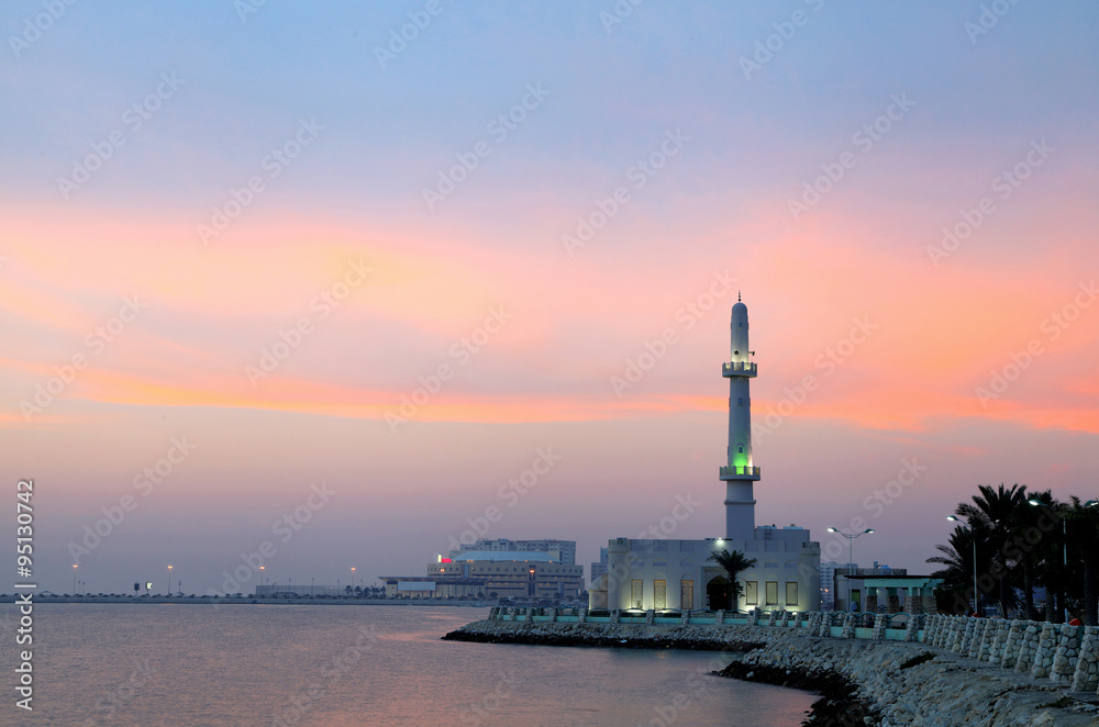 Broad view of mosque at Muharraq corniche during dusk , Bahrain
