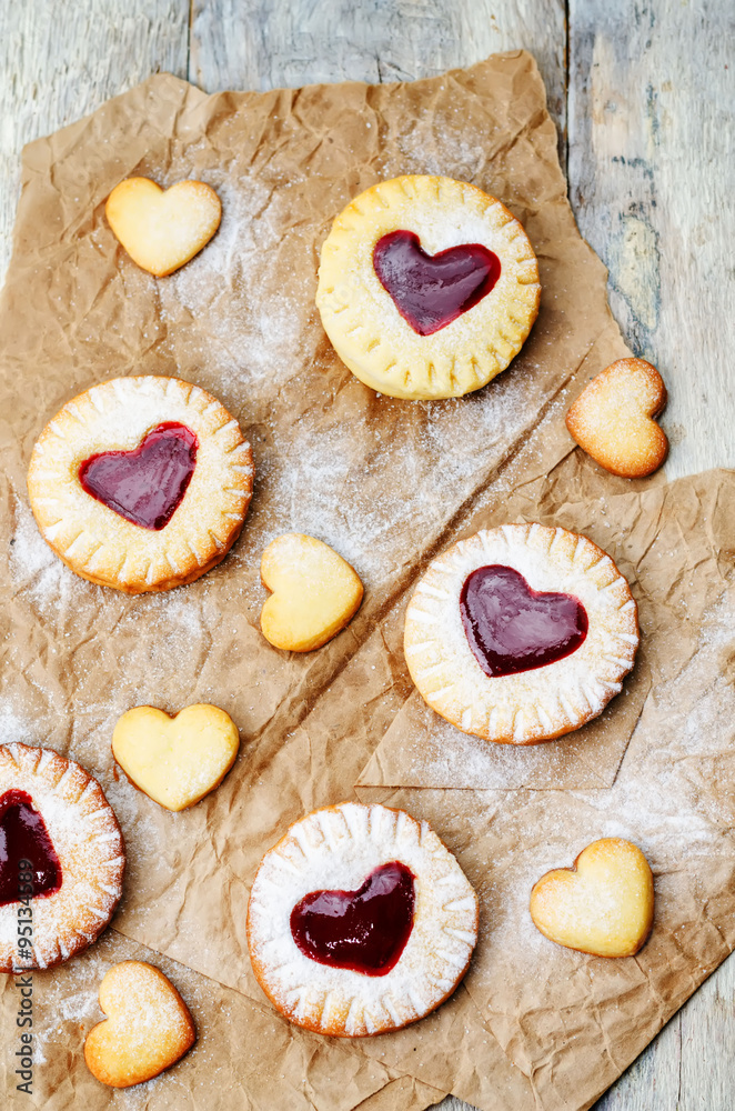 Shortbread with the shape of a heart and berry jam
