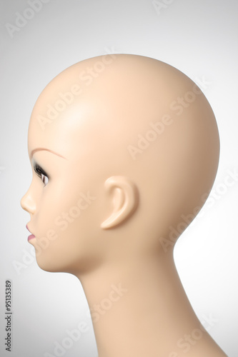 Mannequin head on grey background