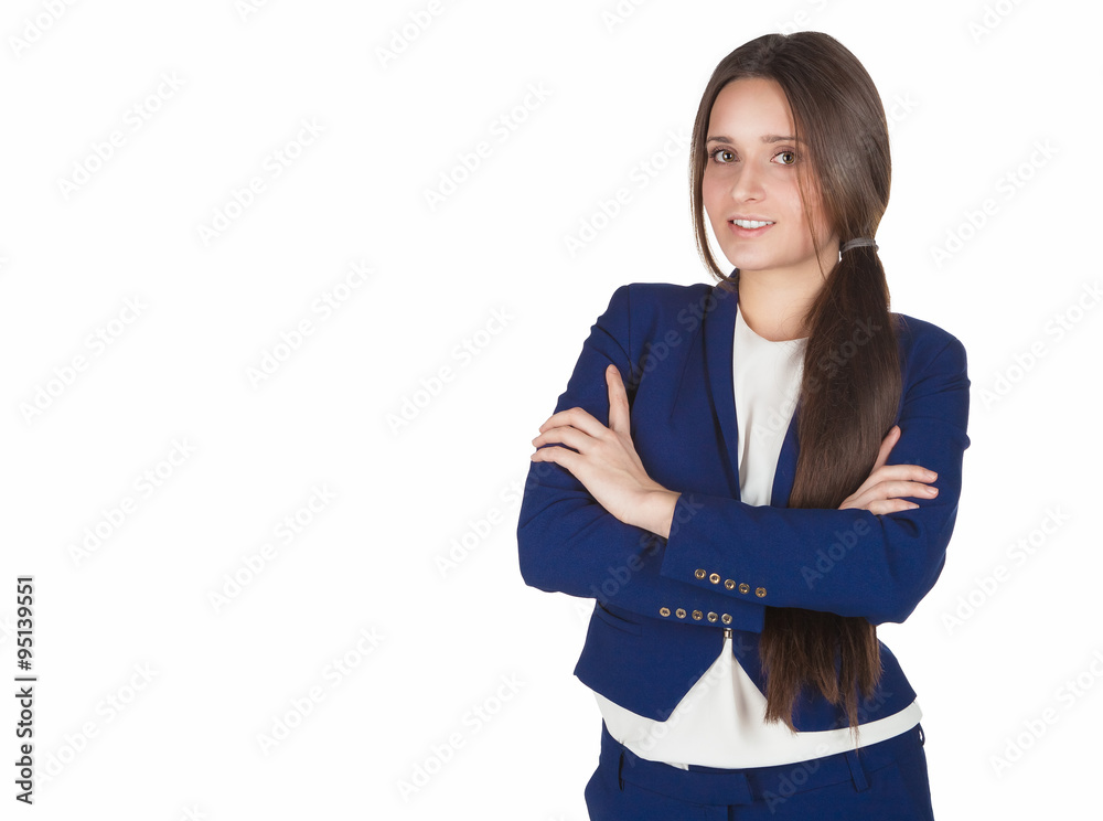 Young business woman in blue costume stands with hands crossed on her chest and smiles isolated. Young business woman in blue costume stands with hands crossed on her chest and smiles isolated.