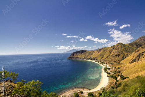 Exotic beach and deep blue sea in East Timor photo