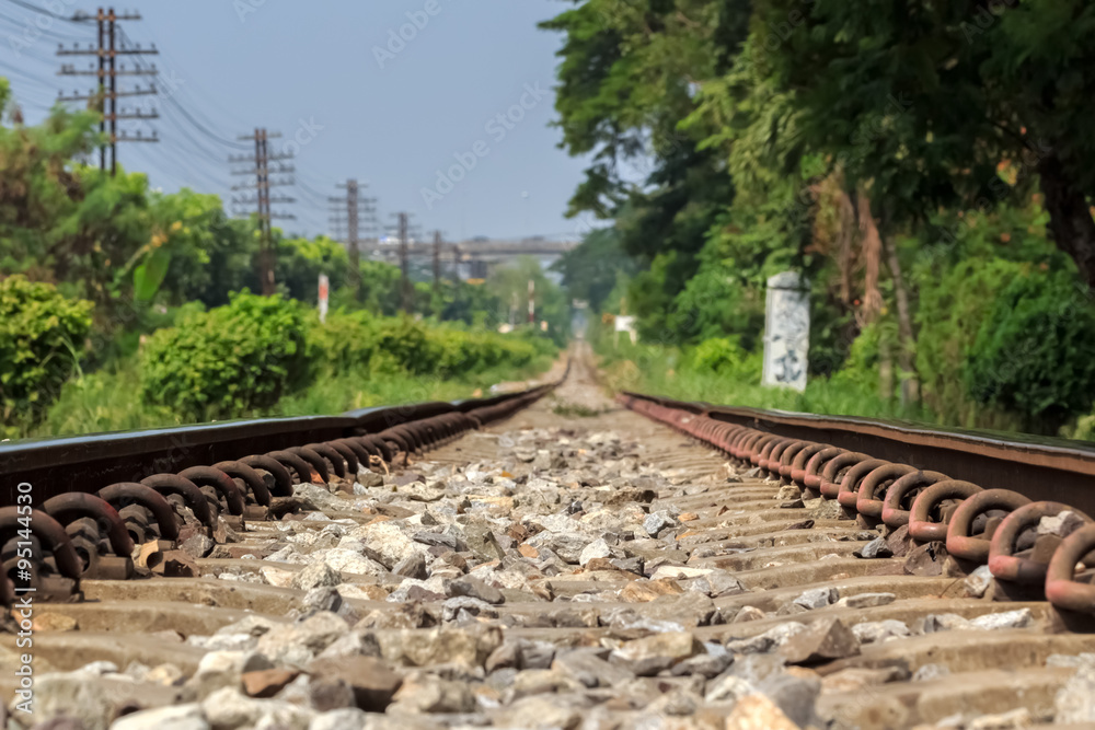 Obraz premium Old Railway Track in selective focus at surface level