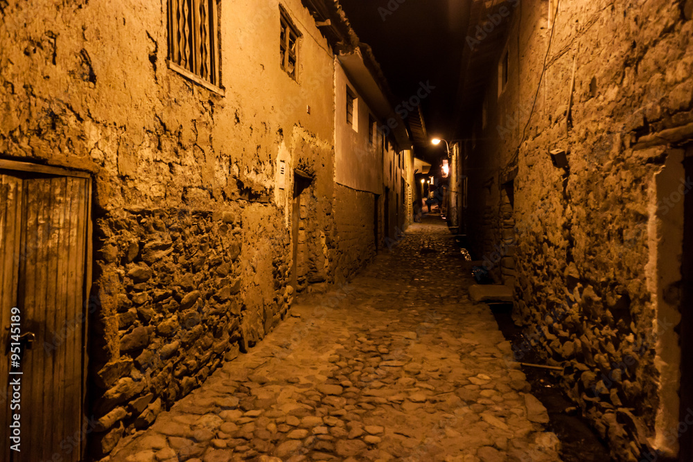 Night view of ancient streets of Ollantaytambo, Sacred Valley of Incas, Peru