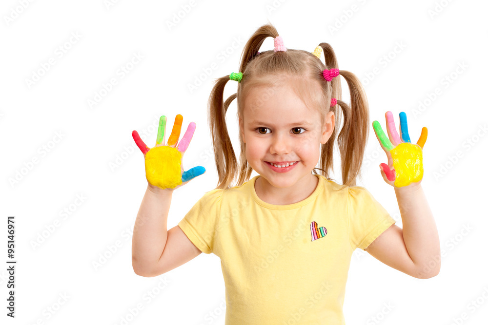 A cheerful small girl with painted by bright colors palms A cheerful small girl with painted by bright colors palms