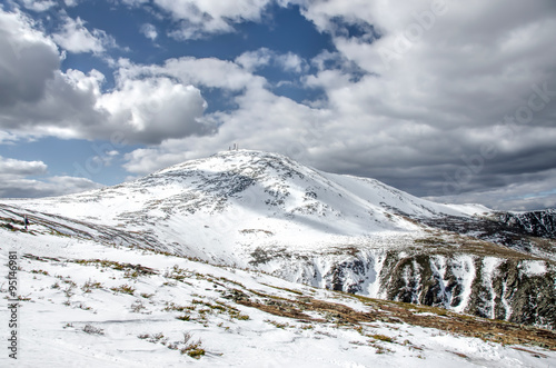 Mount Washington in Spring - Dramatic Mountainside with Melting Snow Sunny with Clouds