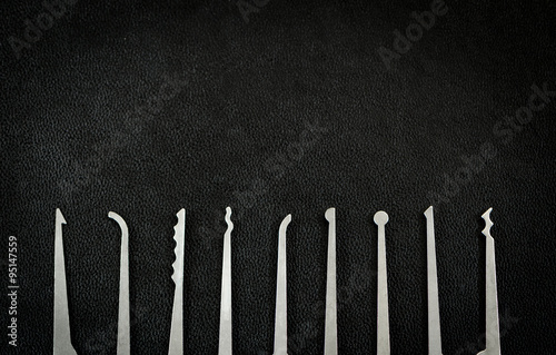 Lock Picking Copy Space Background - Tools Isolated on Black