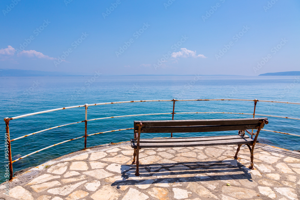 Bench at the ocean's shore