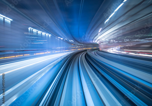 Obraz na płótnie Motion blur of train moving inside tunnel in Tokyo, Japan