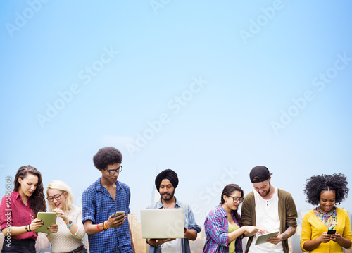 Diverse Students Studying Together Technology Concept