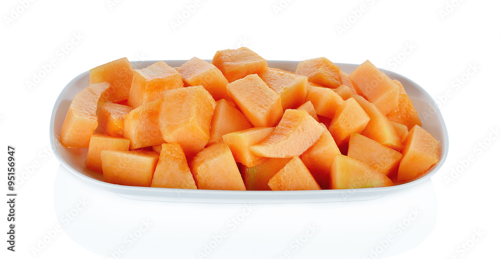 Sliced melon,cantaloupe in white disk on white background Sliced melon,cantaloupe in white disk on white background