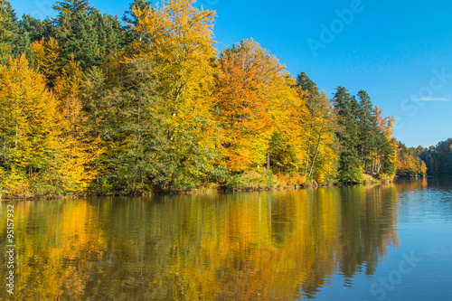 Reflection of trees on Trakoscan lake in Zagorje, Croatia, season, autumn