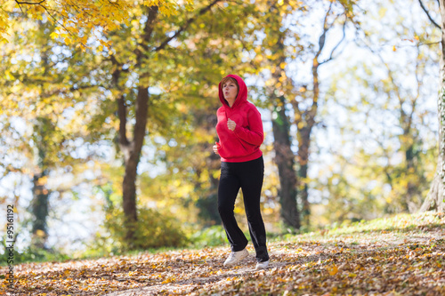 Woman running in park