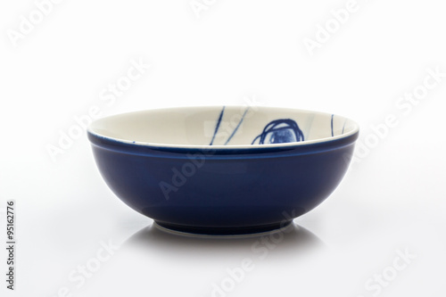 Empty blue ceramic bowl.