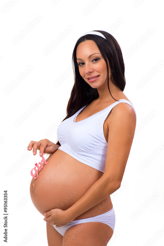 Happy pregnant woman holding near tummy pink label Happy pregnant woman holding near tummy pink label