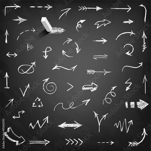 Set of chalk arrows isolated on black background