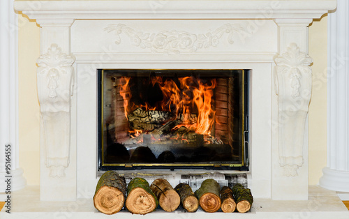 Classic Fireplace in white stone with ornaments