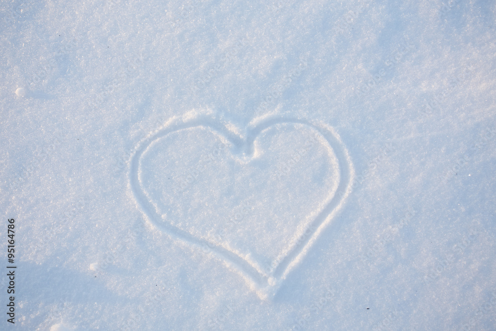Heart shape drawn on snow 