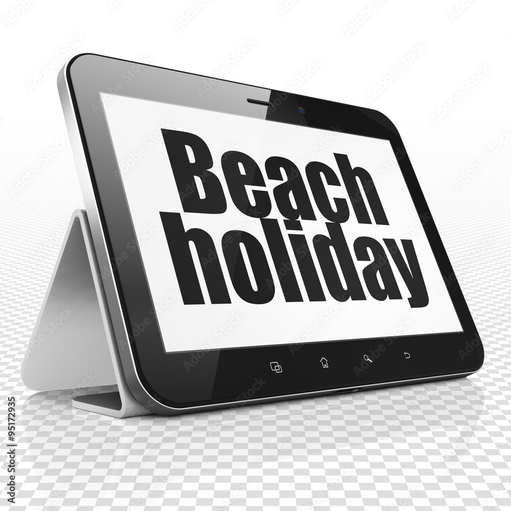 Travel concept: Tablet Computer with Beach Holiday on display Travel concept: Tablet Computer with Beach Holiday on display