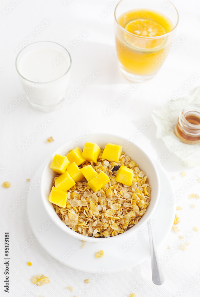 Healthy breakfast. Corn flakes, muesli, granola, with fresh orange juice Healthy breakfast. Corn flakes, muesli, granola, with fresh orange juice