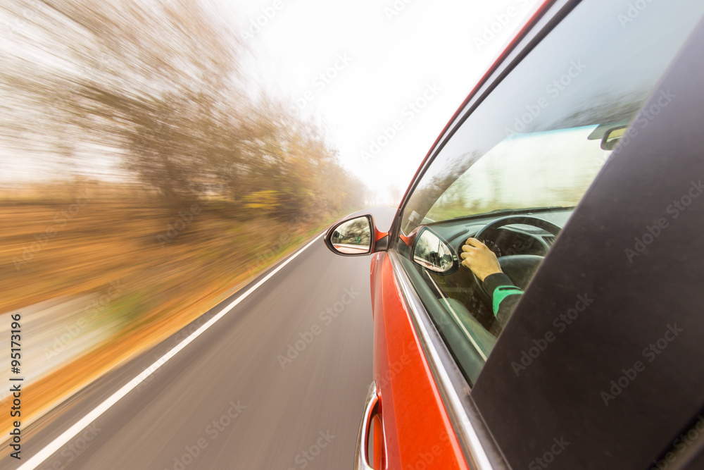 Obraz premium speeding car with motion blur background.