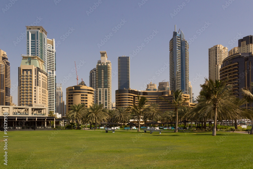 Dubai hi-tech cityscape, with modern buildings and fancy stores. Dubai hi-tech cityscape, with modern buildings and fancy stores.