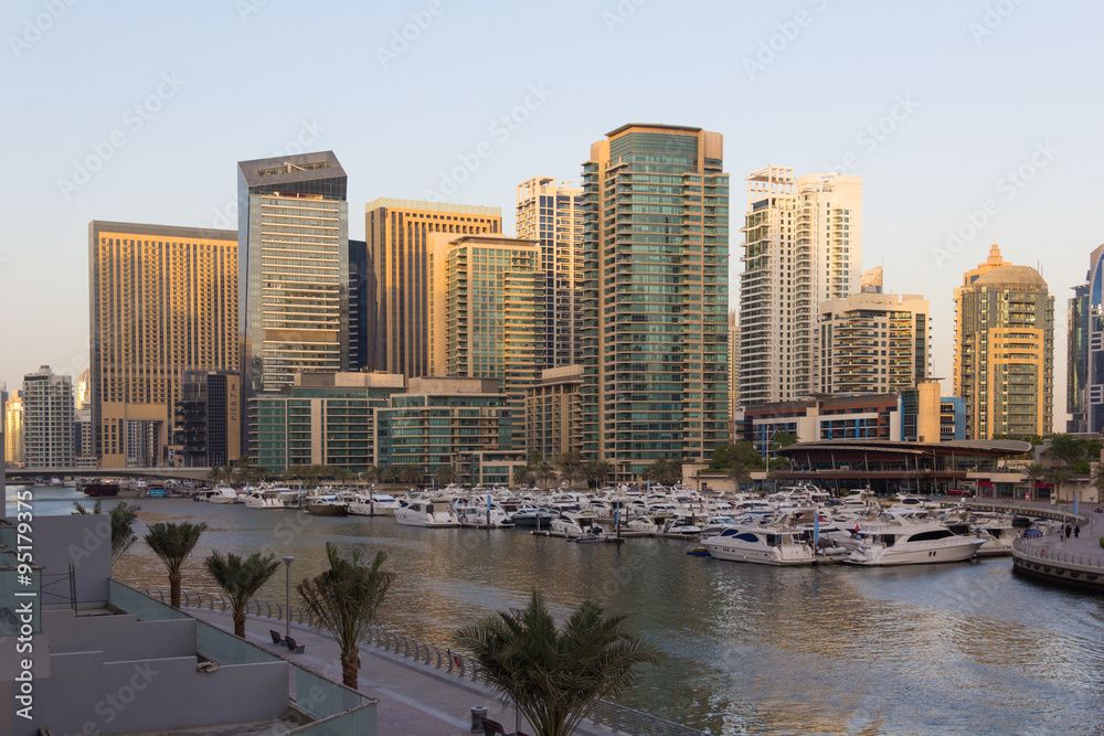 Obraz premium Dubai hi-tech cityscape, with modern buildings and fancy stores.
