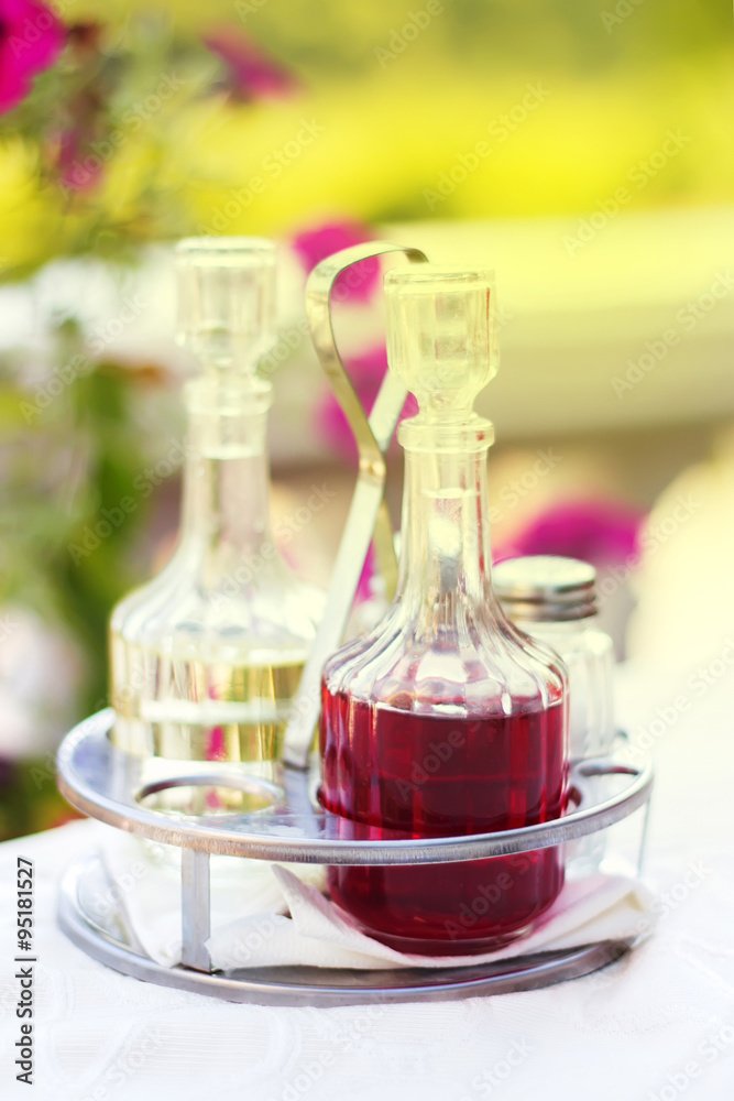 Grape vinegar and olive oil on a table
Grape vinegar and olive oil on a table