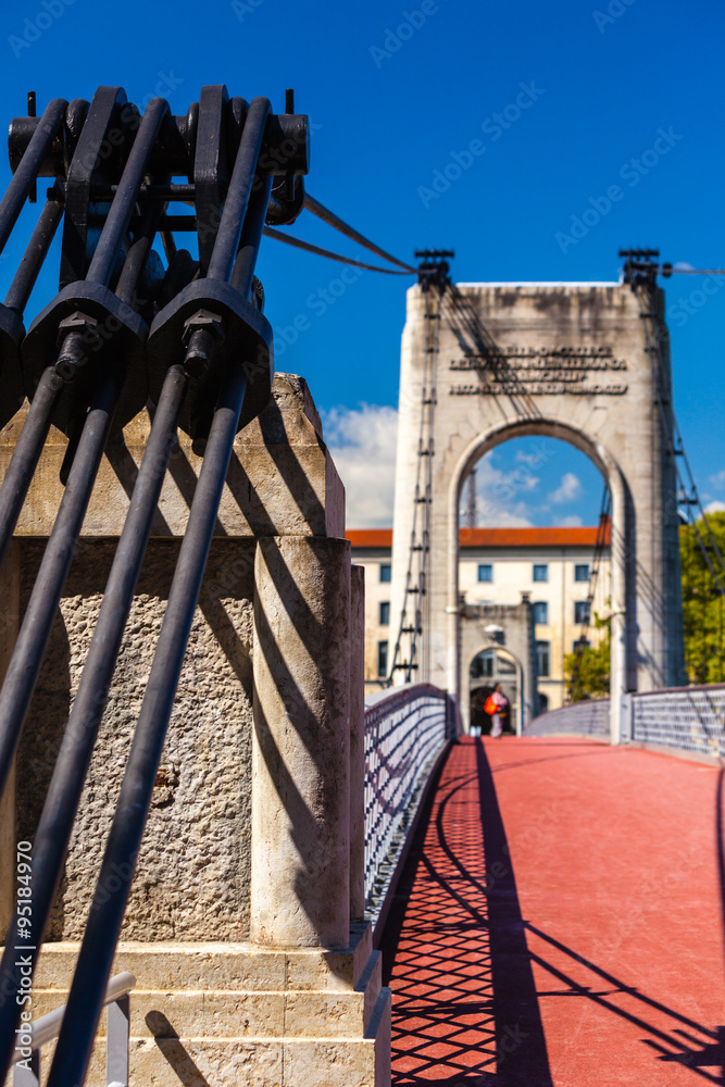 Fototapeta premium Old Passerelle du College bridge over Rhone river in Lyon, Franc