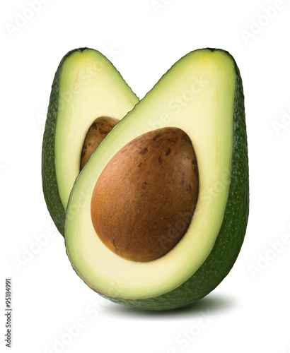 Vertical avocado cut halves isolated on white background