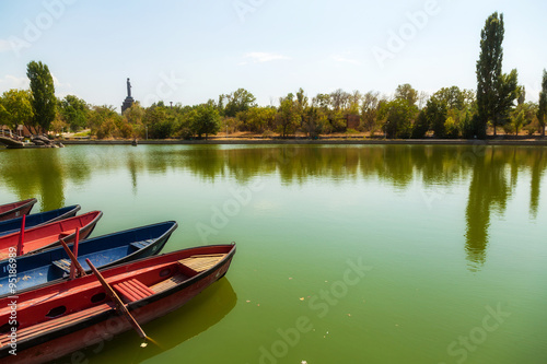 Fototapeta Naklejka Na Ścianę i Meble -  Color boats on the lake