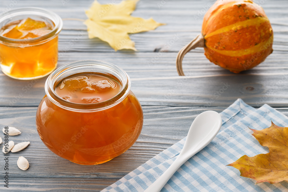 Fresh pumpkin jam on a blue background Fresh pumpkin jam on a blue background