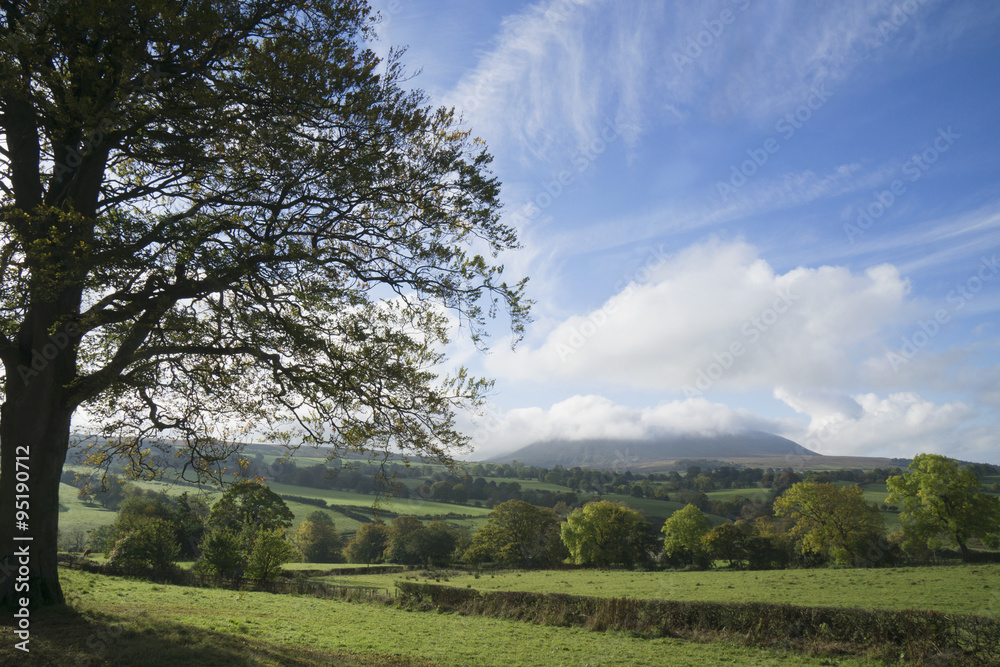 View of mystical Pendle Hill in low cloud, Lancashire, UK