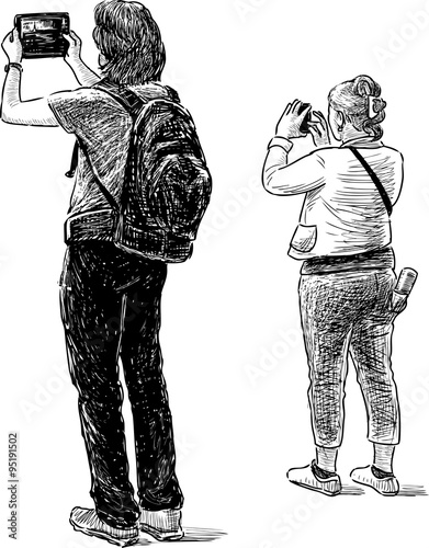 sightseers take pictures