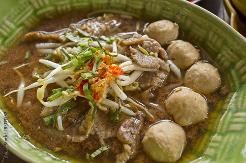 Thai noodle soup. Serve with Basil, bean Sprouts. (Kuay Tiew Ruer)
Noodle and casseroled beef  - Thailand food photo