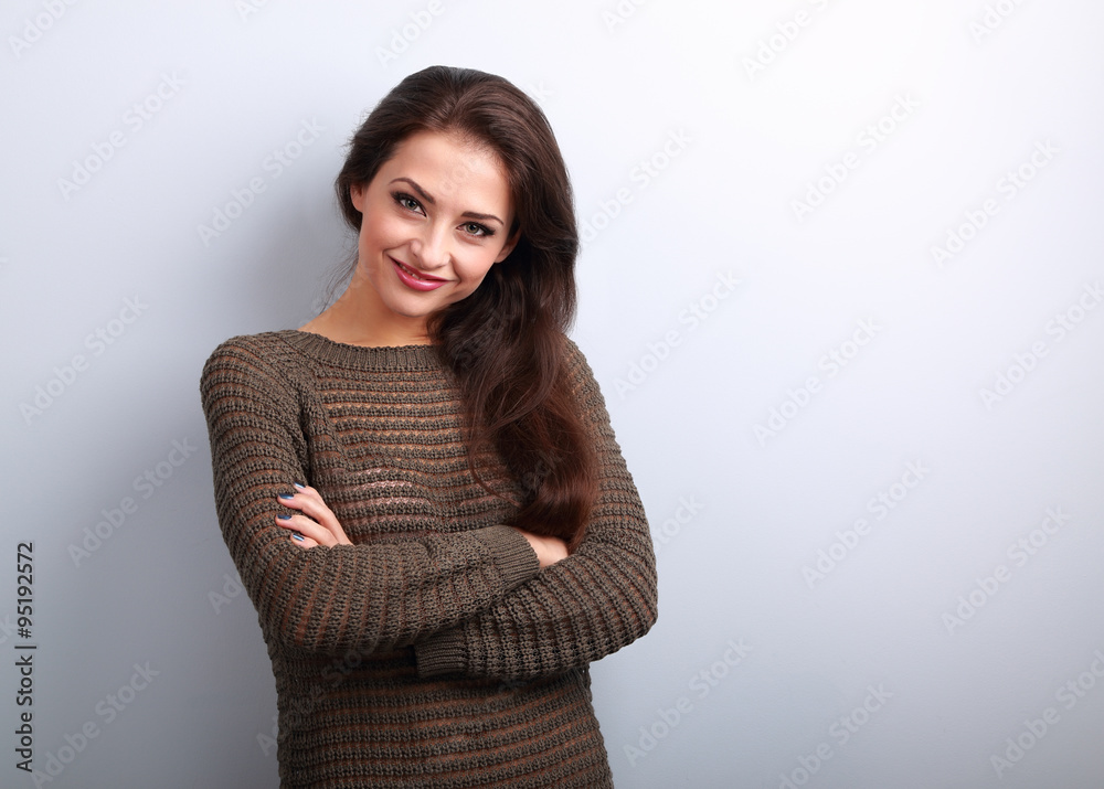 Happy young brunette woman smiling in warm sweater Happy young brunette woman smiling in warm sweater
