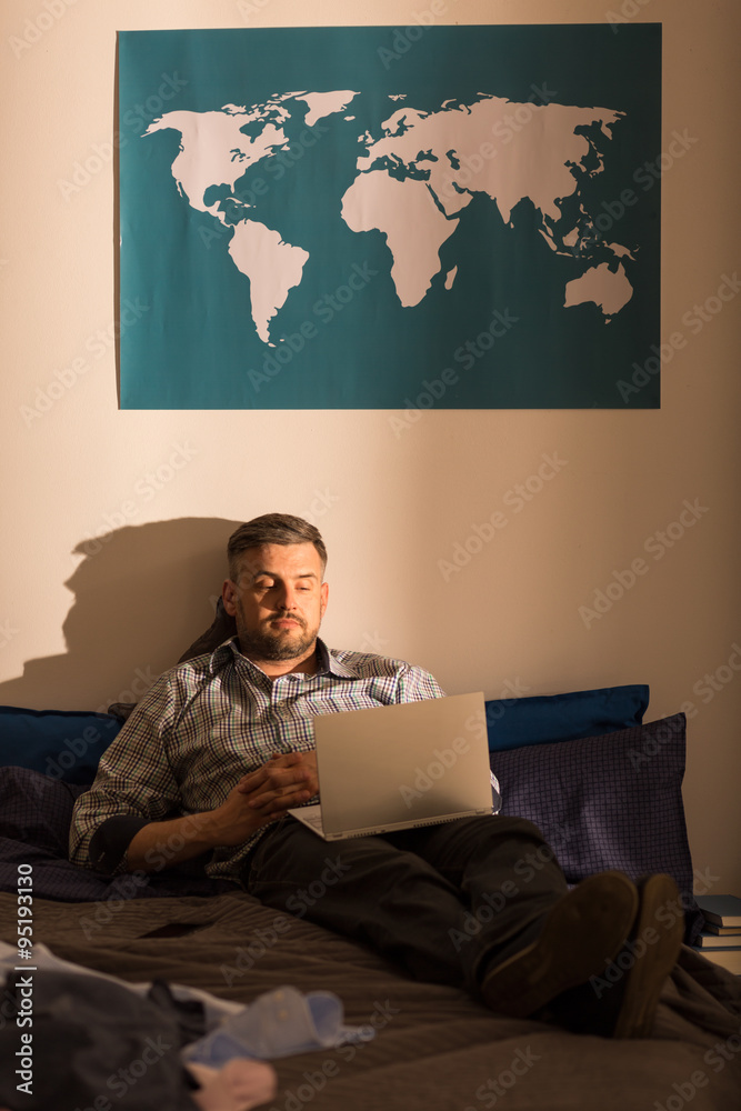 Lonely male using laptop