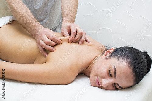 Woman in a beauty salon doing massage